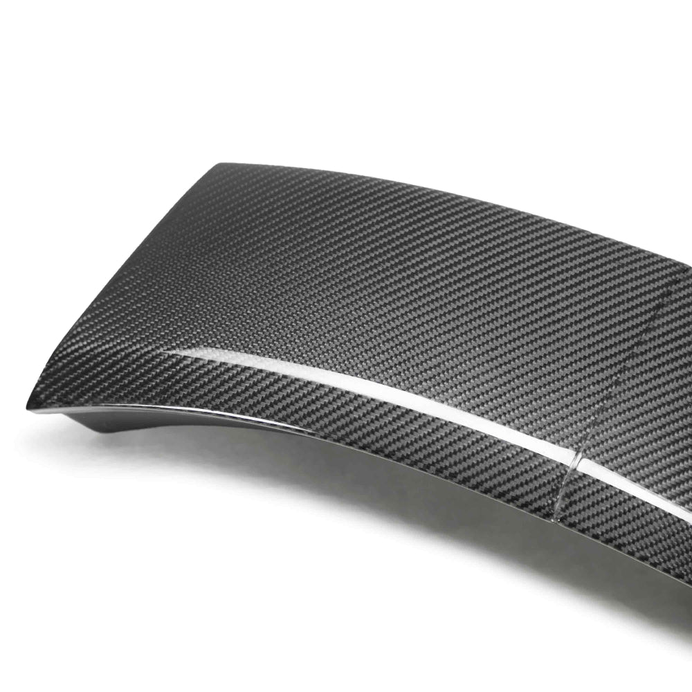Close-up view showing carbon fiber weave pattern and smooth OEM-style integration.
