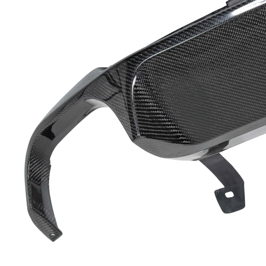 Top-down shot showing diffuser shape, mounting alignment, and carbon texture.