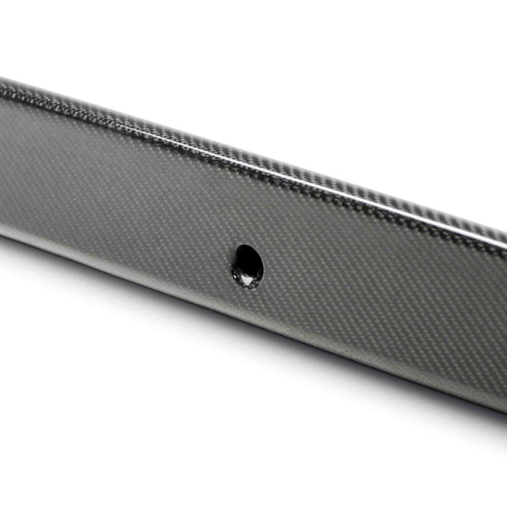 Close-up of 3K twill carbon fiber weave and gloss finish