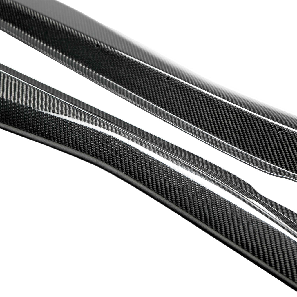 Close-up of 3K 2×2 twill carbon fiber weave on Anderson Composites Z06 rocker splitters with gloss finish.