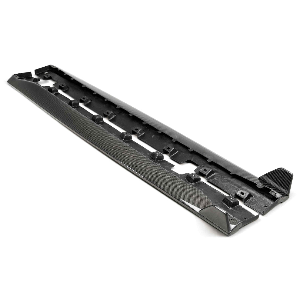 Anderson Composites GT350-style carbon fiber rocker panel splitters for 2015–2017 Ford Mustang — side view showing gloss finish and sculpted design.