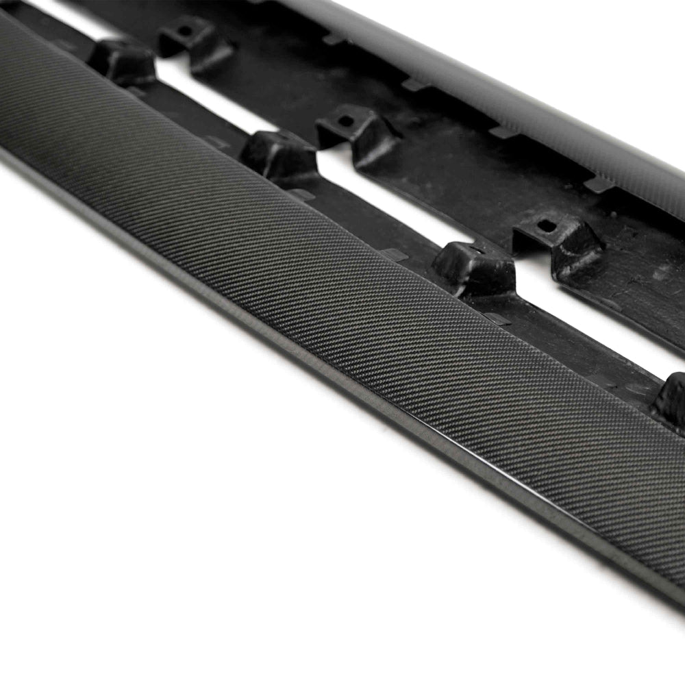 Close-up of Anderson Composites 3K 2×2 twill carbon fiber weave with UV-resistant clear coat and smooth edges.