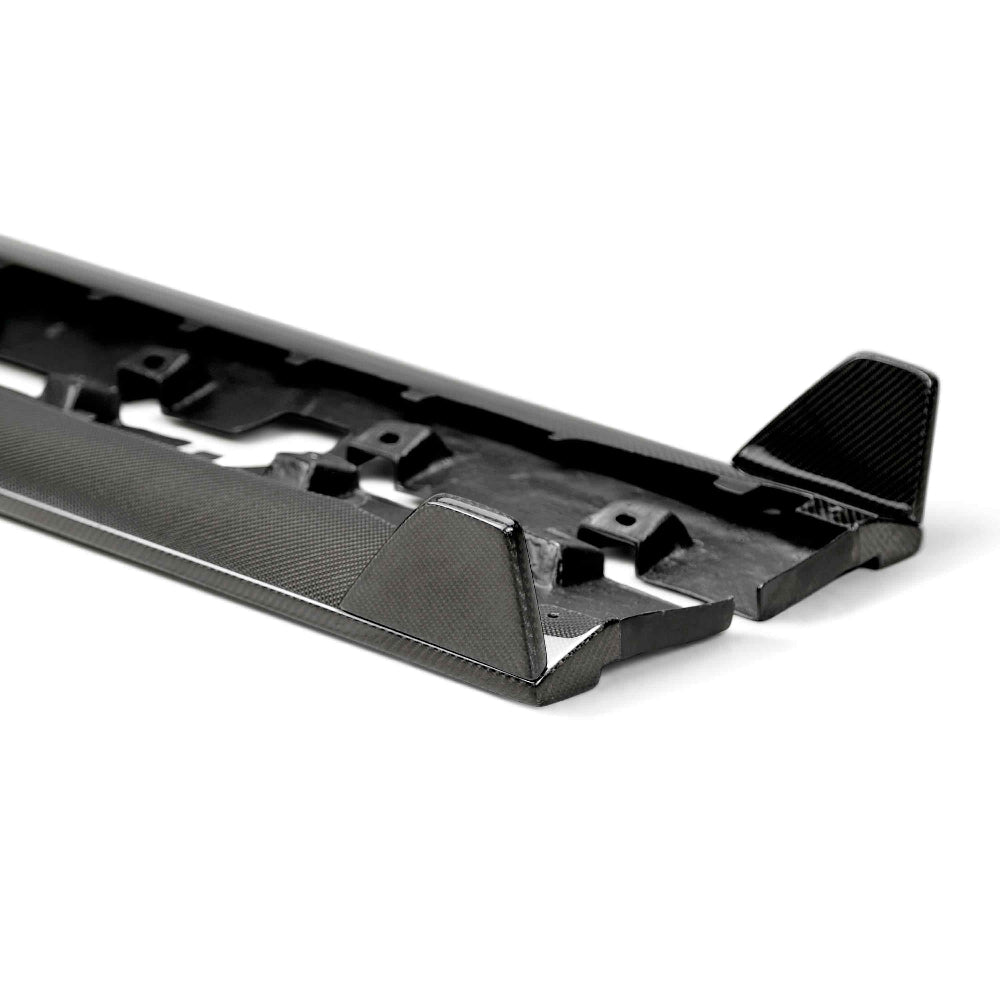 Rear-angle view of Ford Mustang featuring Anderson Composites carbon fiber side splitters and aerodynamic body lines.