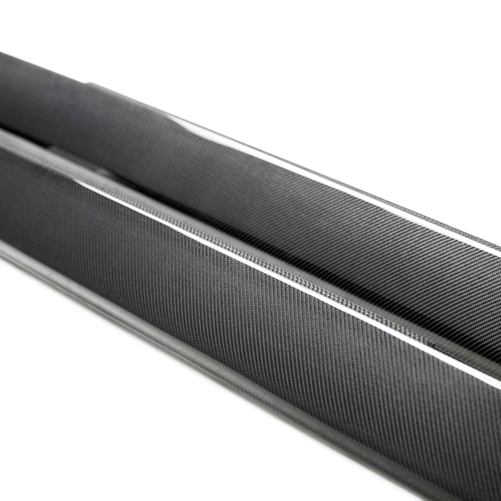 Close-up of 3K 2x2 twill carbon weave texture with gloss UV finish.