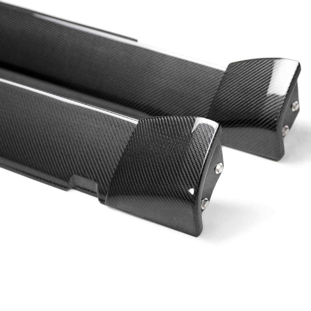 Profile shot highlighting widebody fitment and aerodynamic contour.