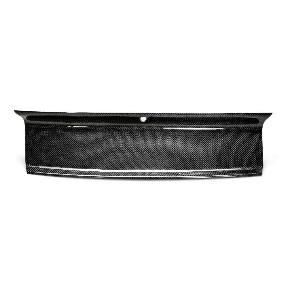 Rear view highlighting smooth emblem-free carbon fiber finish and OEM-style contour.