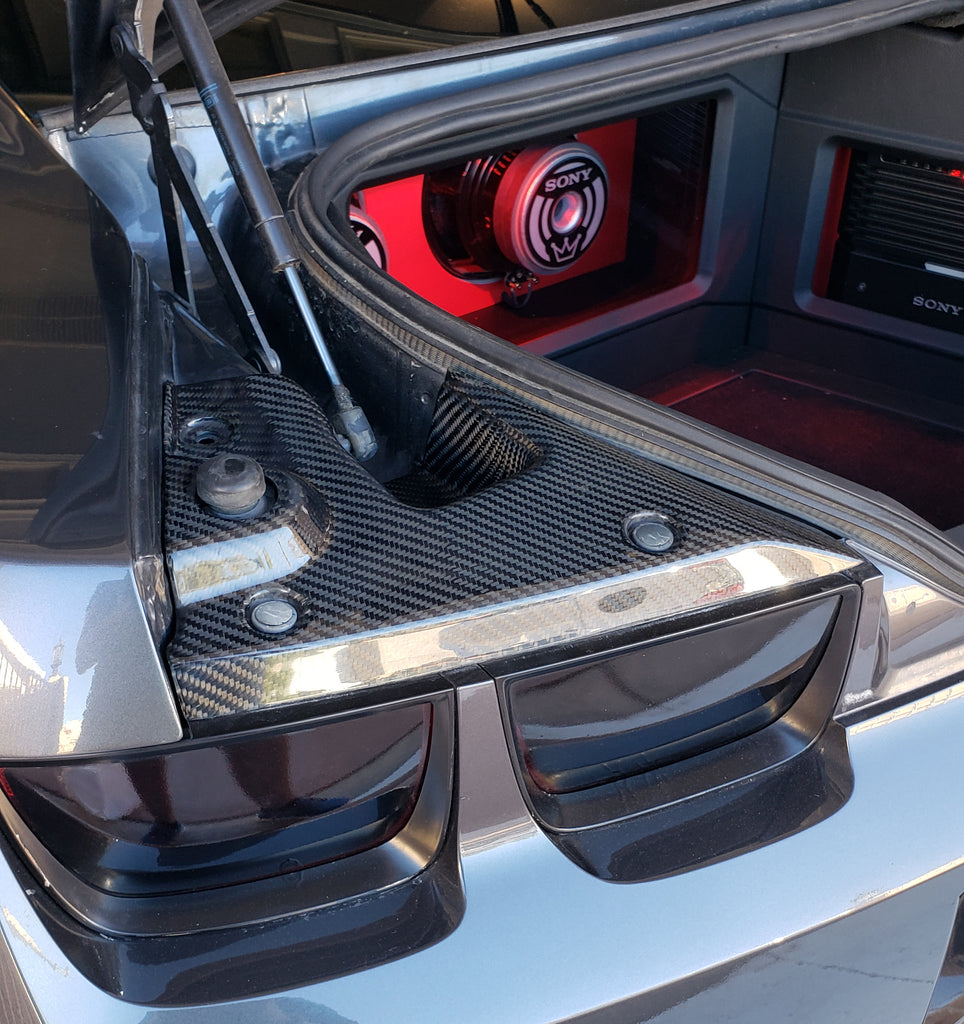 Rear view of Anderson Composites Camaro carbon fiber decklid interior panels installed inside trunk.