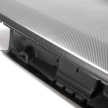 Load image into Gallery viewer, Close-up of dry carbon weave and autoclave-cured craftsmanship on the Anderson Composites decklid.