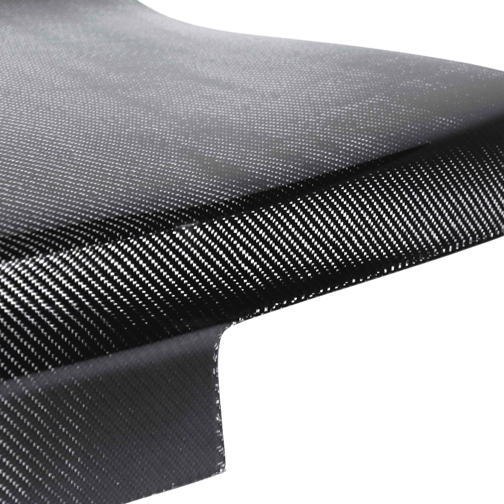 Close-up detailing the vacuum-infused 3K 2x2 carbon fiber weave and high-gloss surface finish.