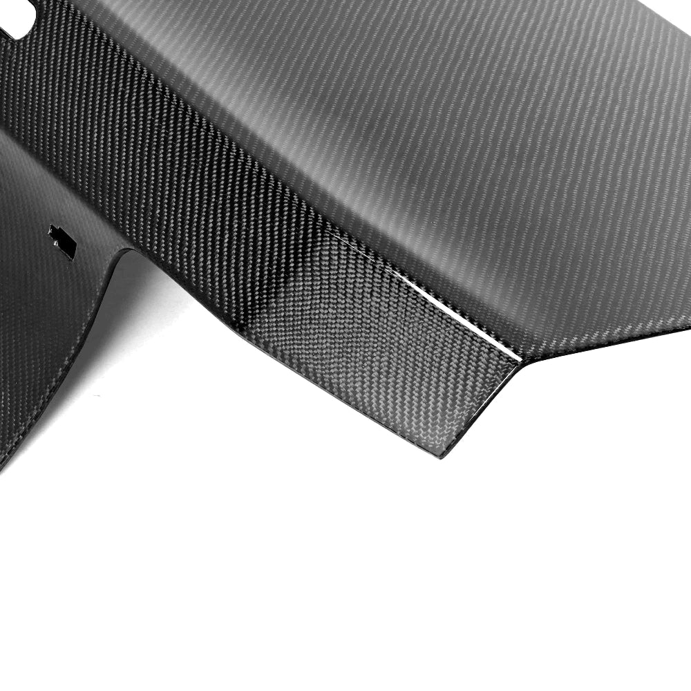Side angle showcasing smooth contour fitment and premium carbon fiber craftsmanship.