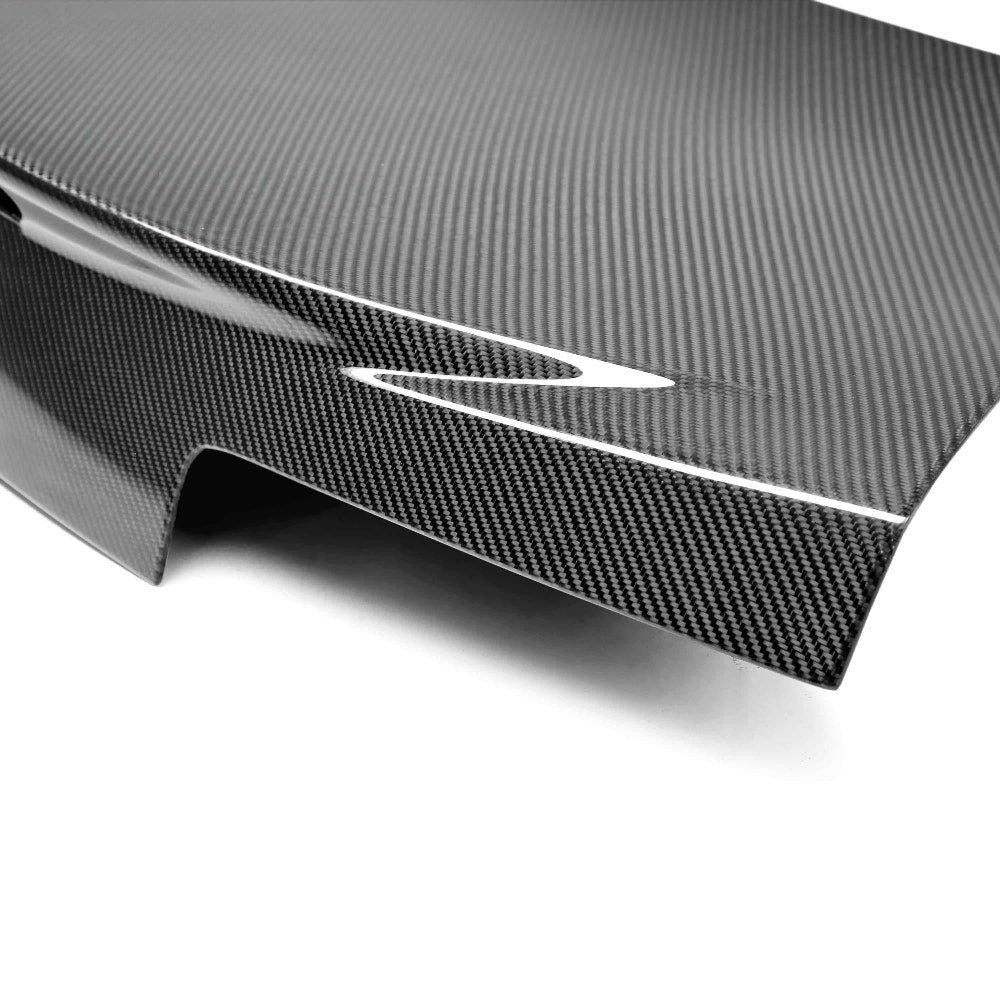 Underside view showing precision mounting points and lightweight structure of the dry carbon decklid.