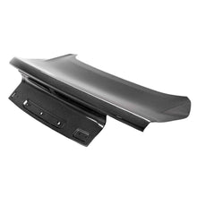 Load image into Gallery viewer, Front angle of Anderson Composites carbon fiber Type-OE decklid for 2015–2023 Ford Mustang, showing high-gloss finish and precision weave pattern.
