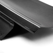 Load image into Gallery viewer, Underside of decklid showing fully bonded carbon fiber skeleton structure for rigidity and lightweight strength.