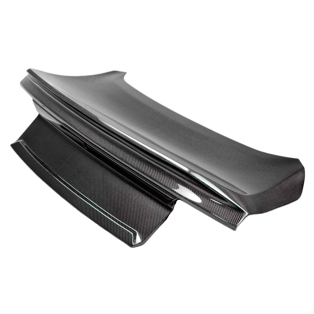 Close-up view of the Anderson Composites 2015–2023 Ford Mustang Type-ST Double-Sided Carbon Fiber Decklid showing its premium 3K 2x2 twill weave finish and integrated spoiler design.