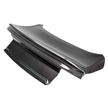 Load image into Gallery viewer, Close-up view of the Anderson Composites 2015–2023 Ford Mustang Type-ST Double-Sided Carbon Fiber Decklid showing its premium 3K 2x2 twill weave finish and integrated spoiler design.