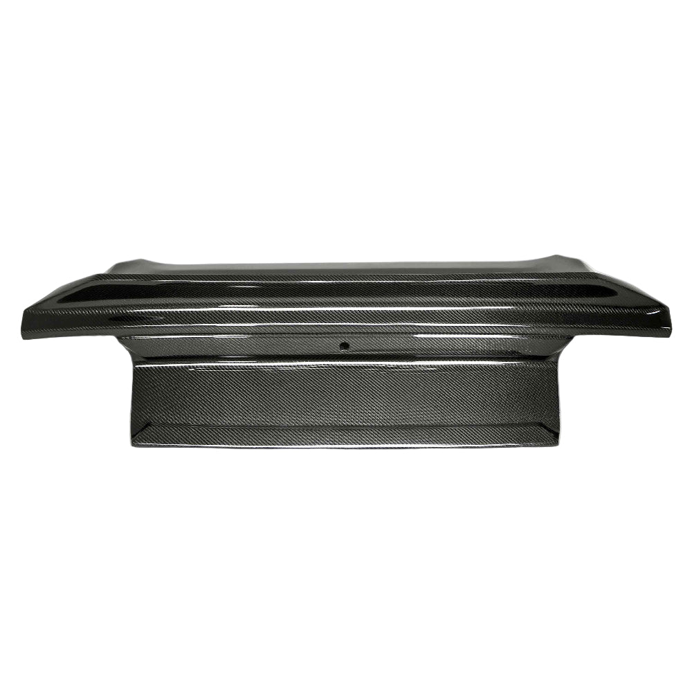 Rear profile of the Anderson Composites carbon fiber Type-ST decklid displaying the integrated spoiler and smooth OEM-fit lines on the 2015–2023 Ford Mustang.