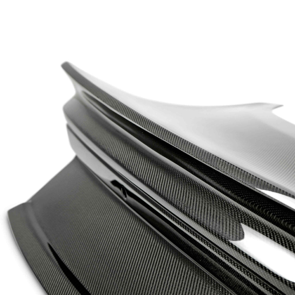 Side angle showing the Type-ST integrated spoiler contours of the Anderson Composites 2015–2023 Mustang carbon fiber decklid for enhanced aerodynamic performance.
