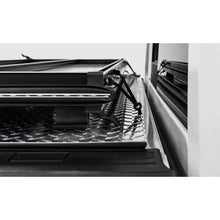 Load image into Gallery viewer, Access LOMAX Tri-Fold Cover Black Urethane Finish 22+ Toyota Tundra - 5ft 6in Bed - image 8
