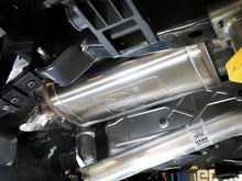 Load image into Gallery viewer, aFe Rock Basher exhaust muffler and pipe installed underneath a truck, angled underbody view