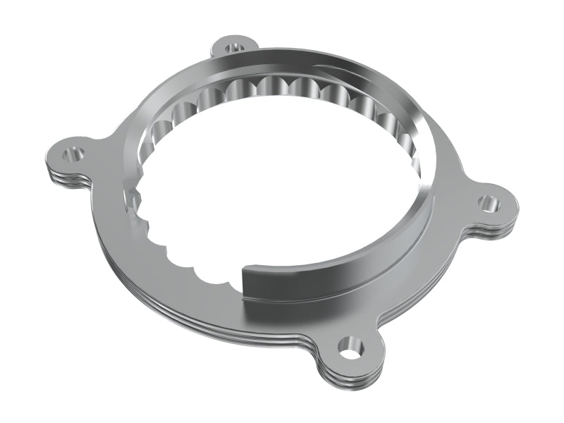 aFe Silver Bullet throttle body spacer ring, top view showing internal vane pattern