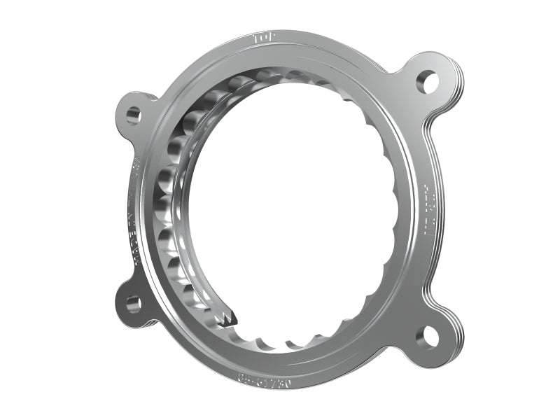 aFe Silver Bullet throttle body spacer ring, angled view showing mounting flange and tabs
