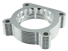 Load image into Gallery viewer, aFe Silver Bullet Throttle Body Spacers TBS Nissan Frontier/Pathfinder/Xterra 05-09 V6-4.0L aFe AFE46-36002