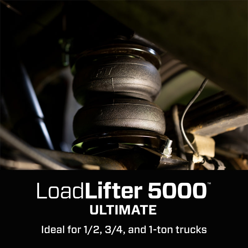 Dark close-up of an installed LoadLifter 5000 Ultimate bellows in the rear suspension with the series name overlaid