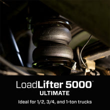 Load image into Gallery viewer, Dark close-up of an installed LoadLifter 5000 Ultimate bellows in the rear suspension with the series name overlaid