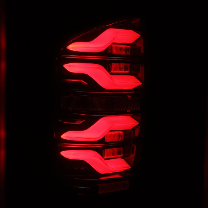 AlphaRex 16-21 Toyota Tacoma LUXX LED Taillights Blk/Red w/Activ Light/Seq Signal - Black Ops Auto Works
