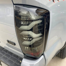 Load image into Gallery viewer, Product image 2 showing the AlphaRex tail lights identified as ARX680092.