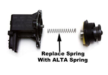 Load image into Gallery viewer, Kit contents including spring, instructions, and ALTA decals