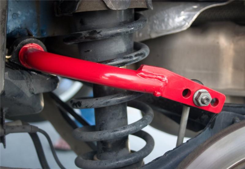 Close-up of hollow tubular chromoly construction and red powdercoat