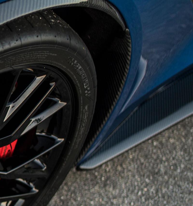 Installed front mud flap on Corvette Z06 showing seamless alignment