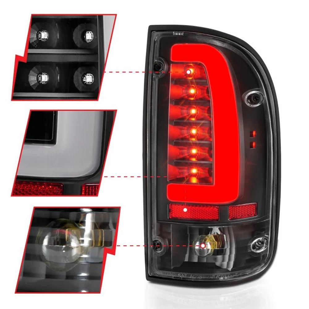 ANZO 311353 passenger-side LED tail light for 1995-2000 Toyota Tacoma illuminated with closeups of the LED array, side marker, and reverse bulb