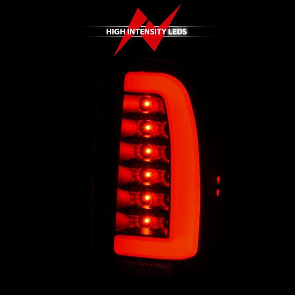 ANZO 311353 LED tail light for 1995-2000 Toyota Tacoma glowing red at night to demonstrate high-intensity LED output