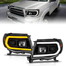 Load image into Gallery viewer, ANZO 05-11 Toyota Tacoma Projector Headlights w/Light Bar Switchback Black Housing ANZO ANZ111564