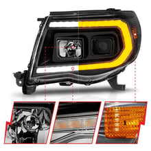 Load image into Gallery viewer, ANZO 05-11 Toyota Tacoma Projector Headlights w/Light Bar Switchback Black Housing ANZO ANZ111564