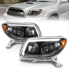 Load image into Gallery viewer, ANZO 06-09 Toyota 4 Runner Projector Headlights Plank Style - Black ANZO ANZ111616