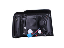 Load image into Gallery viewer, ANZO 1992-1996 Ford F-150 Projector Headlights w/ Halo Black w/ Side Markers and Parking Lights ANZO ANZ111184