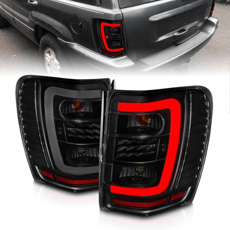ANZO 1999-2004 Jeep Grand Cherokee LED Tail Lights w/ Light Bar Black Housing Smoke Lens - Black Ops Auto Works