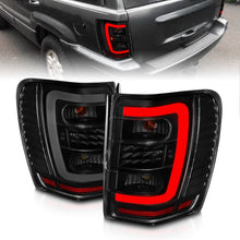 Load image into Gallery viewer, ANZO 1999-2004 Jeep Grand Cherokee LED Tail Lights w/ Light Bar Black Housing Smoke Lens - Black Ops Auto Works