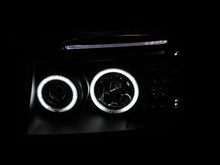 Load image into Gallery viewer, ANZO 2001-2004 Nissan Frontier Projector Headlights w/ Halo Black (CCFL) ANZO ANZ111172