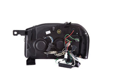 Load image into Gallery viewer, ANZO 2001-2004 Nissan Frontier Projector Headlights w/ Halo Black (CCFL) ANZO ANZ111172