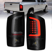 Load image into Gallery viewer, ANZO 2002-2006 Dodge Ram 1500 LED Tail Lights w/ Light Bar Black Housing Smoke Lens ANZO ANZ311369