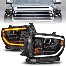 Load image into Gallery viewer, ANZO 2014-2017 Toyota Tundra LED Crystal Headlights w/ Switchback Black Housing w/ DRL ANZO ANZ111531