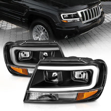 Load image into Gallery viewer, ANZO 99-04 Jeep Grand Cherokee Crystal Headlights - w/ Light Bar Black Housing ANZO ANZ111537