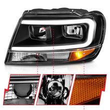 Load image into Gallery viewer, ANZO 99-04 Jeep Grand Cherokee Crystal Headlights - w/ Light Bar Black Housing ANZO ANZ111537