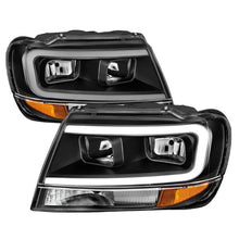 Load image into Gallery viewer, ANZO 99-04 Jeep Grand Cherokee Crystal Headlights - w/ Light Bar Black Housing ANZO ANZ111537