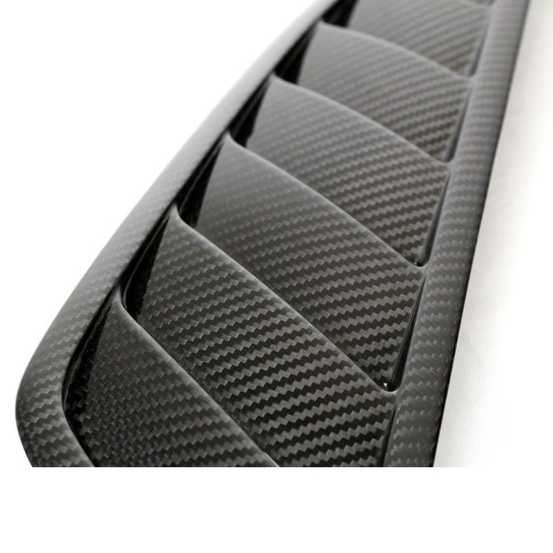 Close-up of carbon fiber weave and clear coat finish