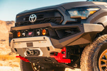 Load image into Gallery viewer, Close-up of the ARB Zenith bumper grille and integrated auxiliary lights on a Tacoma